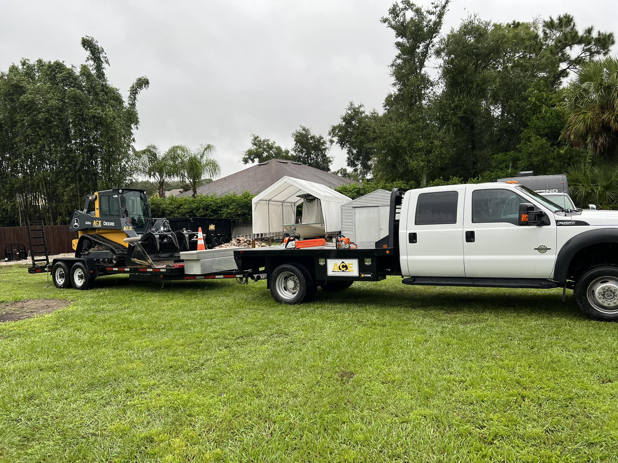 Ace Land Development truck and equipment ready for work