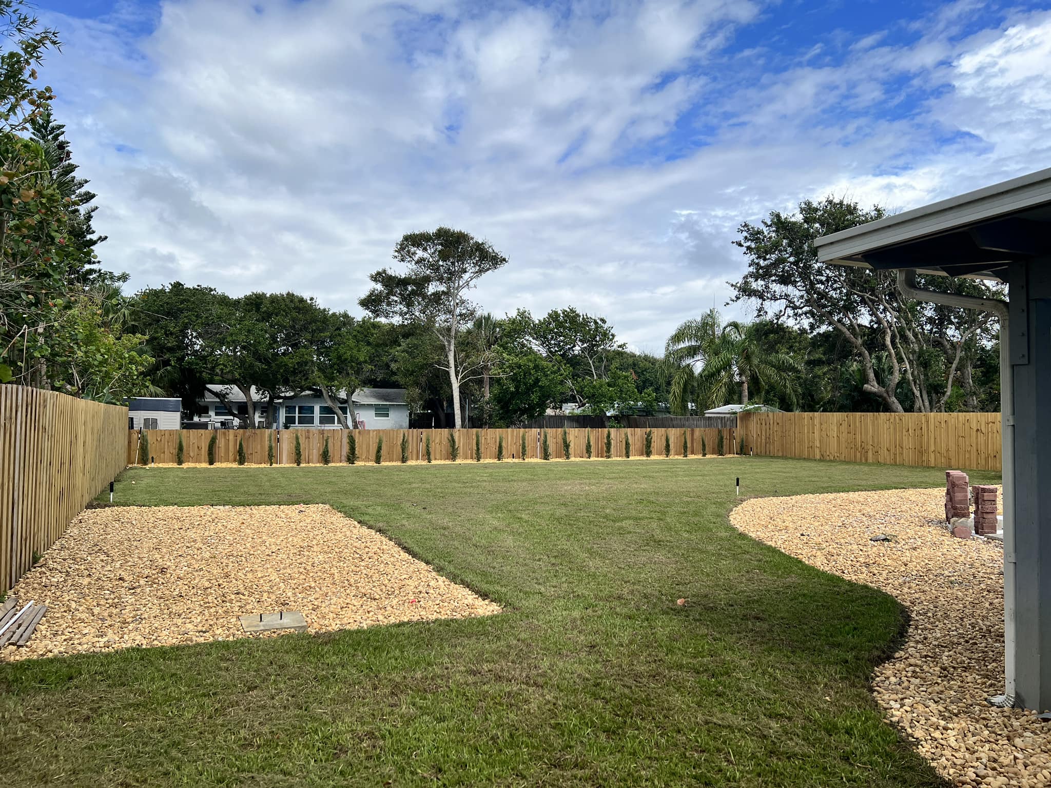 Finished landscape and drainage improvements around a Central Florida home