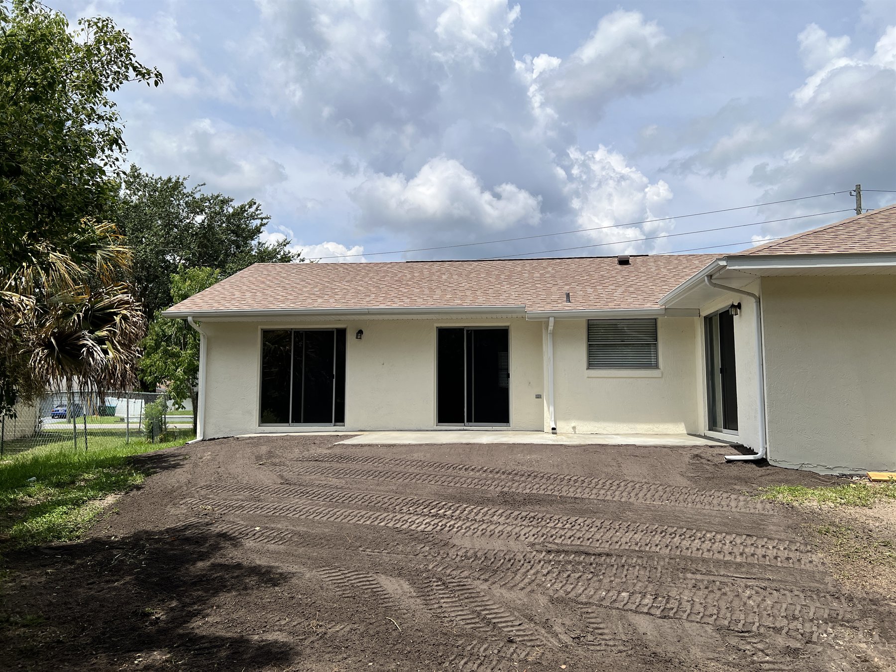 Completed finish grading around a residential project
