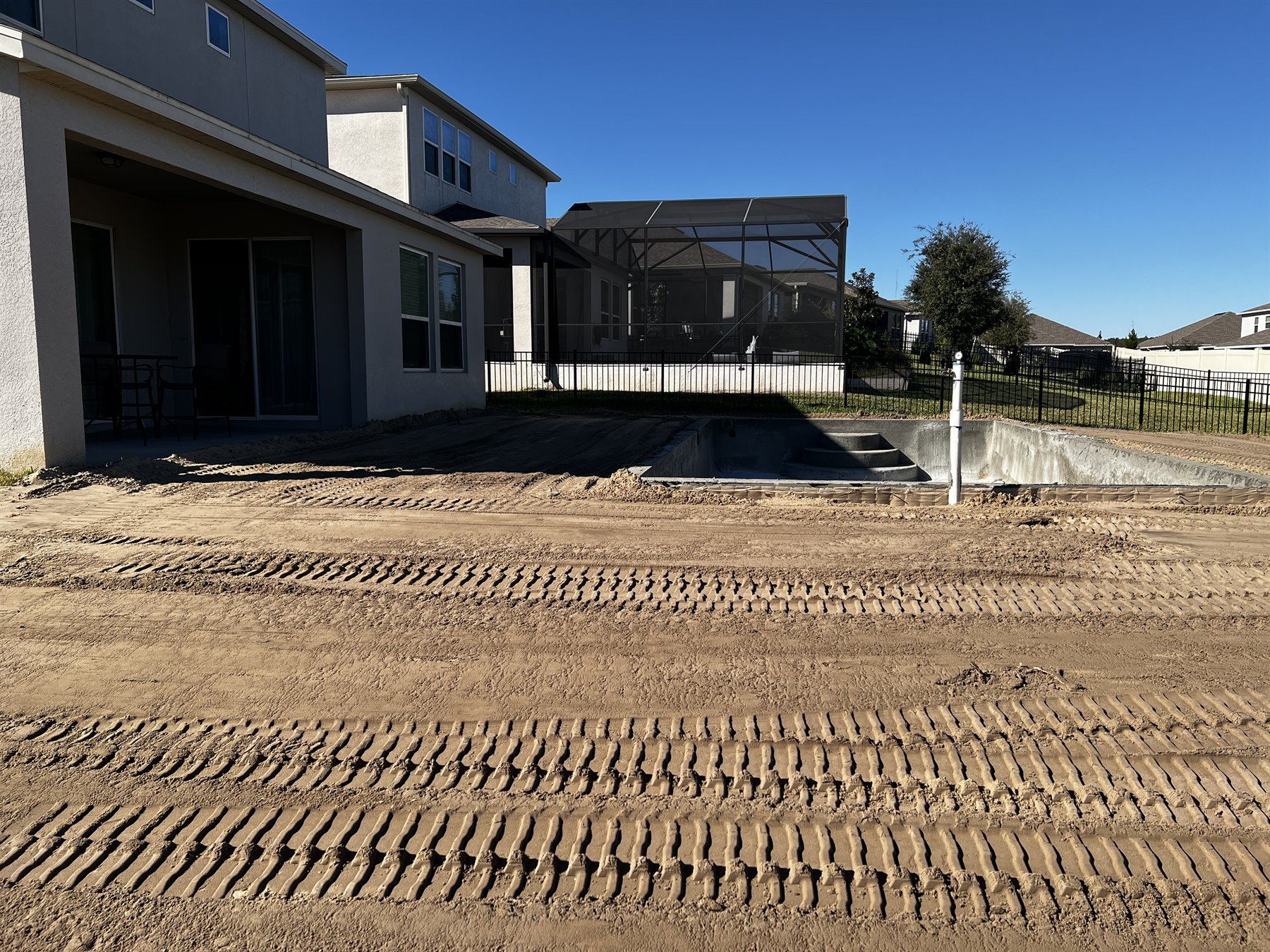 Smooth finish grading completed around a Florida property